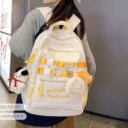 کوله پشتی فانتزی وارداتی همراه با کیف کوچک و آویز رنگ های مشکی سفید زرد آبی بنفش کوله مدرسه کیف مدرسه