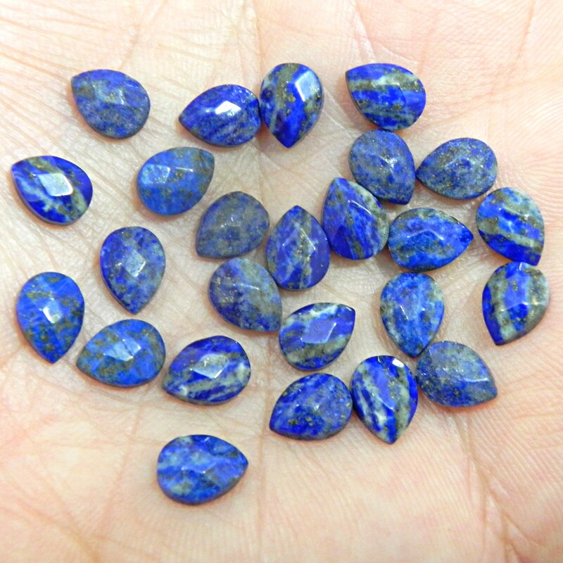 نگین سنگ لاجورد آبی افغانستان اصل سایز9میل الماس تراش اشک