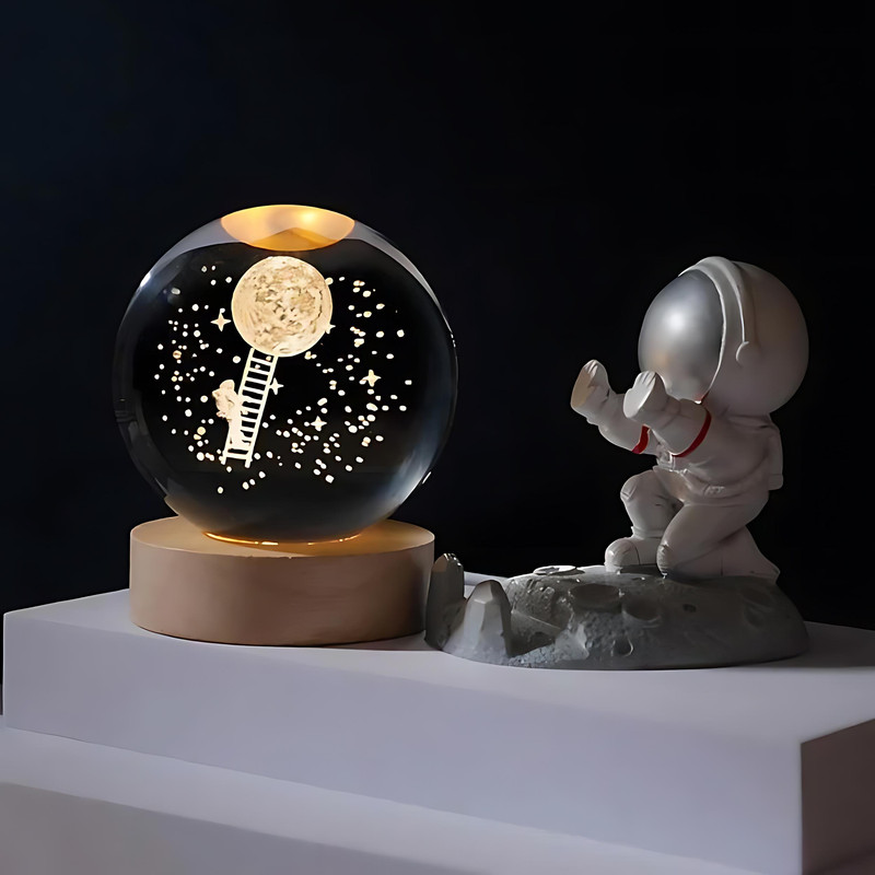 چراغ خواب مدل گوی شیشه ای سه بعدی طرح فضانورد و ماه نردبان