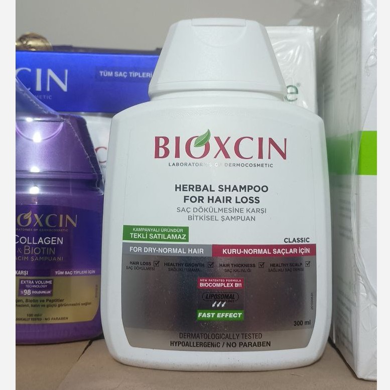 شامپو بیوکسین سفید شامپو ضد ریزش موهای چرب(قیمت پایین به دلیل افتتاح غرفه)