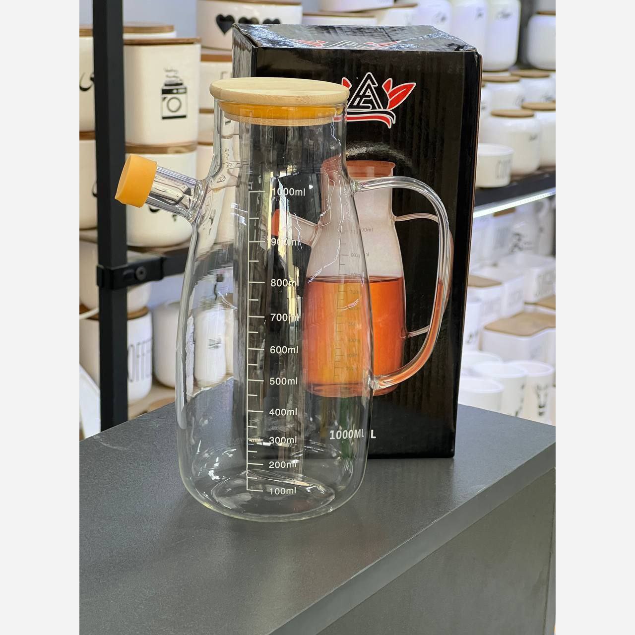 روغن ریز پیرکس تپل یک لیتری دارای درب واشردار درپوش لوله ظرف روغن پیرکس مبلمونسرا مدل 287933