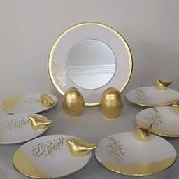 ست هفت سین پرنده کار شده با ورق طلا.شامل شش عدد بشقاب سفالی،یک آینه ودوتخم مرغ.سفد وطلایی