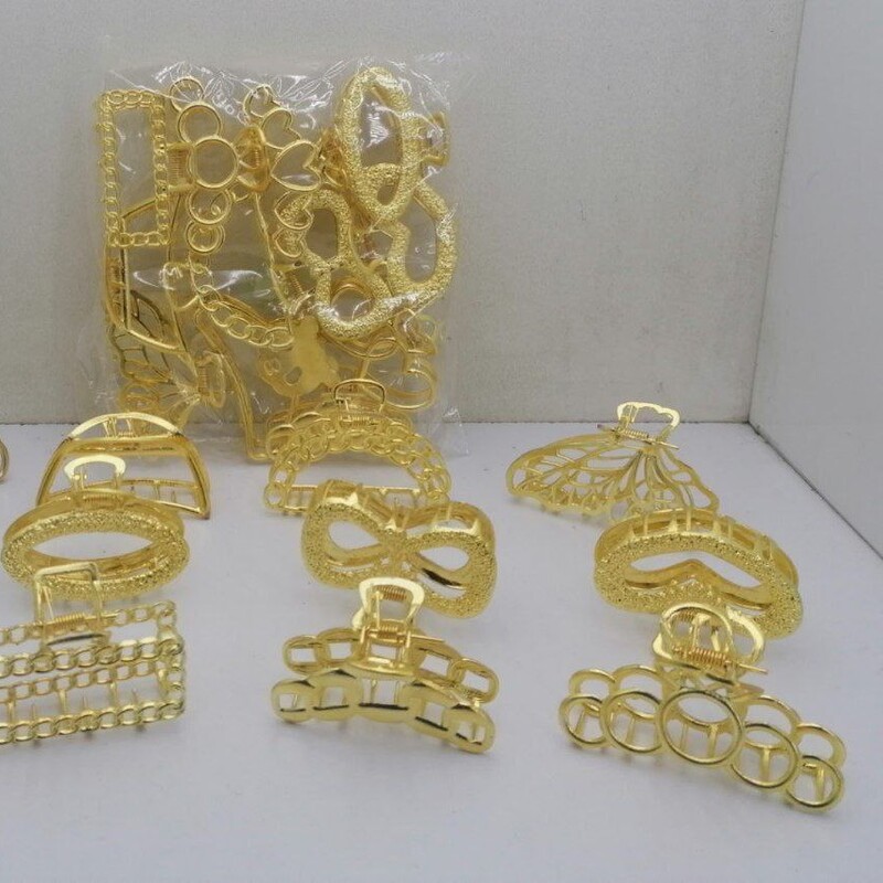 کلیپس فلزی طلایی متوسط ایرانی (12 مدل) 
قیمت یک عدد 14000 تومان. فقط عمده