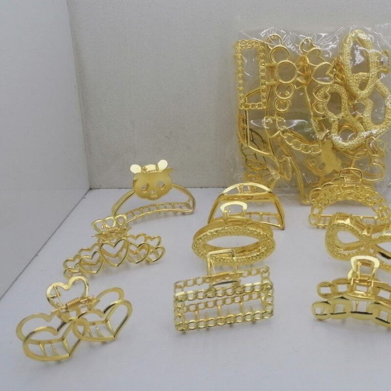 کلیپس فلزی طلایی متوسط ایرانی (12 مدل) 
قیمت یک عدد 14000 تومان. فقط عمده