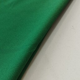 پارچه کرپ اسکاچی رنگ سبز تیره عرض 150 قیمت به ازای یک متر می باشد