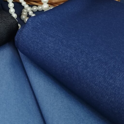 پارچه لی جین ضخیم با کیفیت بالا رنگ آبی تیره عرض 150 قیمت به ازای یک متر می باشد