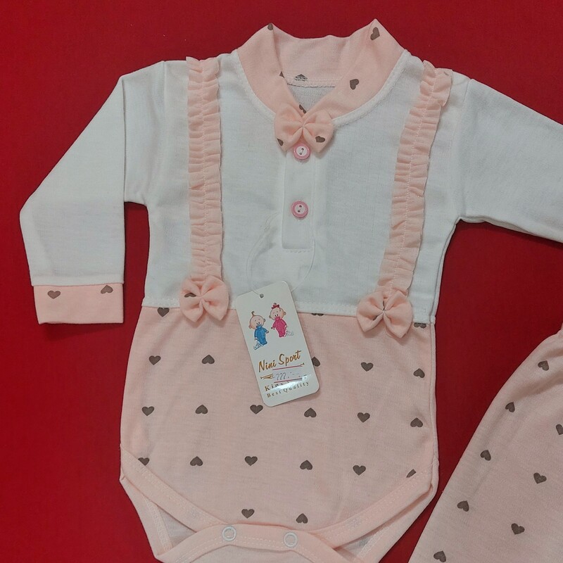 لباس نوزادی دو تکه دخترونه طرح پیشبندی قلب دار  ( با ارسال رایگان به سراسرکشور  ) سایز 1 ، 2 و 3