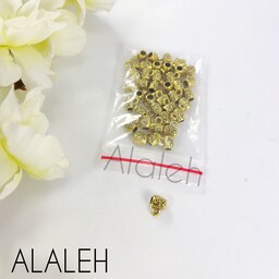 خرجکار بین مهره طلایی طرح بشکه ی آویز دار (فروش به صورت بسته 15 گرمی وتقریباً 40 عدد)