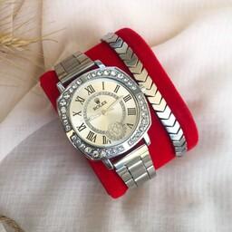 ساعت رولکس زنانه  نگین دار بند استیل نقره ای همراه دستبند