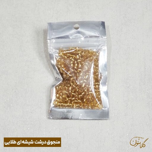 منجوق درشت شیشه ای- رنگ طلایی - بسته 30 گرمی -سایز تقریبا 3 میل - چینی یکدست