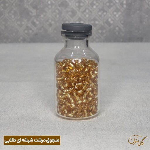 منجوق درشت شیشه ای- رنگ طلایی - بسته 30 گرمی -سایز تقریبا 3 میل - چینی یکدست