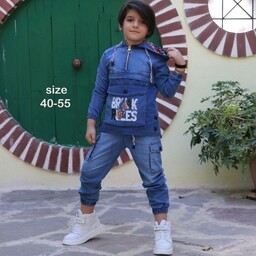 ست بچگانه اسپرت هودی شلوار لی boyandgirl  ،جنس پارچه لی گرم 380 شست آنزیم خورده رنگبندی جین آبی،،سایزبندی 40  الی 55