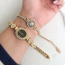 ساعت زنانه نگین دار طلایی صفحه مشکی همراه با دستبند طلایی