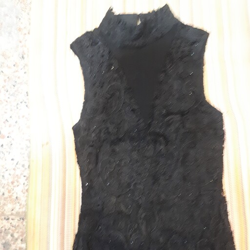 پیراهن مجلسی گیپور جنس اعلا آستر دار استین حلقه یقه ایستاده مطابق عکس محصول 