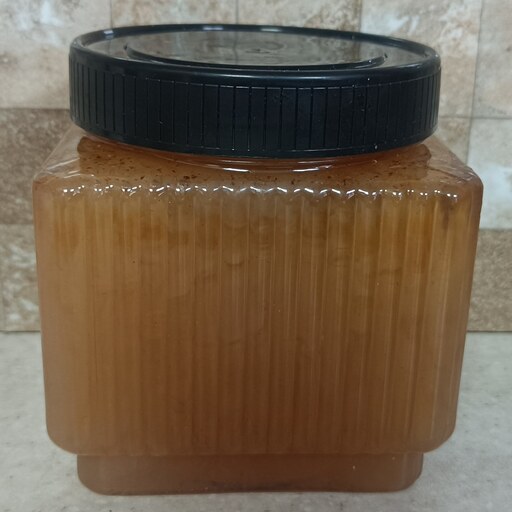 عسل طبیعی کنجد غیر تغذیه ای مستقیم از زنبوردار و کندودار صددرصد تضمینی نیم کیلویی 