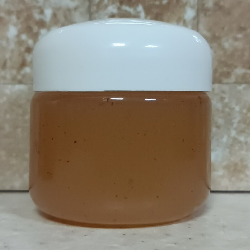 عسل طبیعی کنجد غیر تغذیه ای مستقیم از زنبوردار و کندودار صددرصد تضمینی صد گرم  