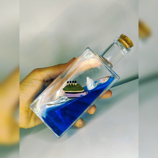 کشتی دکوراتیو معلق تایتانیک و کوه یخ Cruise Ship Fluid Drift Bottle ارسال رایگان 