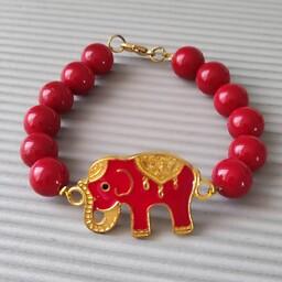 دستبند قرمز با پلاک فیل هندی قرمز و حاشیه طلایی و  شل با روکش قرمز
