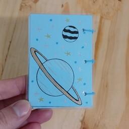 دفترچه دستساز طرح زحل و کهکشان، 72برگ کاغذ دو رنگ آبی بدون خط 