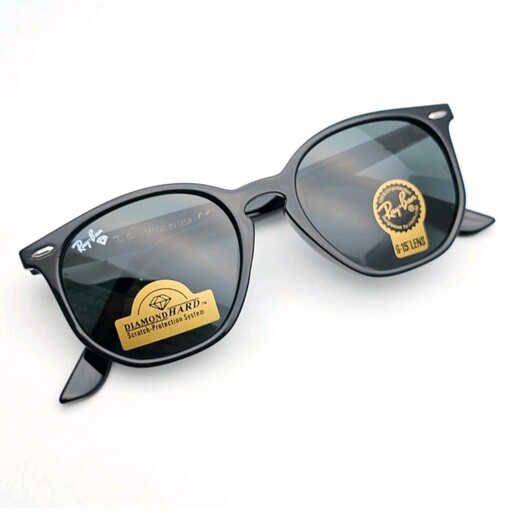 عینک آفتابی مردانه برند ریبن شیشه سنگ اسپرت دارای رنگبندی ارسال رایگان همراه کیف عینک رایگان