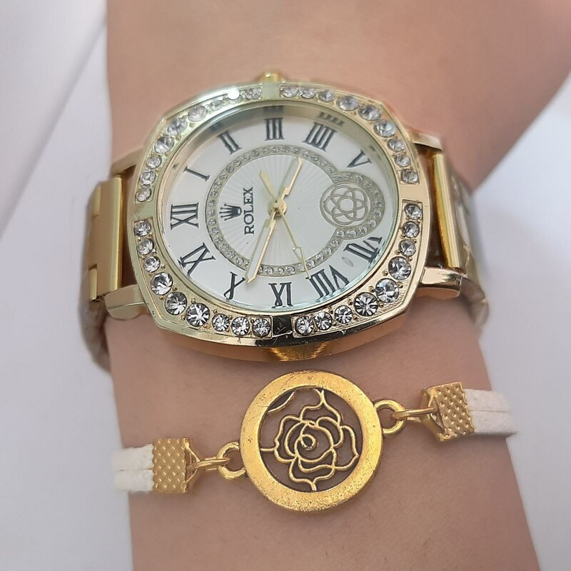 ساعت رولکس زنانه یا دخترانه بند استیل طلایی صفحه سفید فرم مربعی دور قاب نگین رنگ ثابت وارداتی از دبی ( دستبند هدیه )
