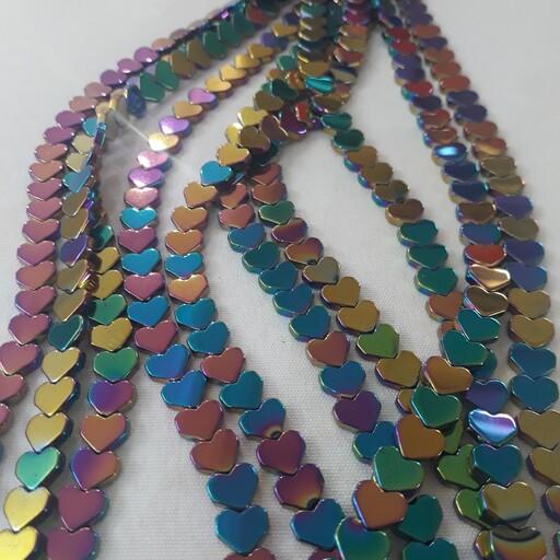 سنگ حدید قلبی سایز 8  رنگ ثابت هفت رنگ فروش بصورت ریسه ای به تعداد 60 عدد مناسب برای  ساخت دستبند و گرنبند