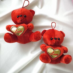 خرس مخملی قرمز رنگ قلب به دست  در ابعاد 15 در 11
