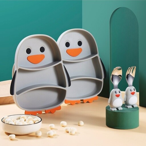 ظرف غذای کودک مدل سیلیکونی طرح پنگوئن به همراه قاشق و چنگال و نی گیره دار