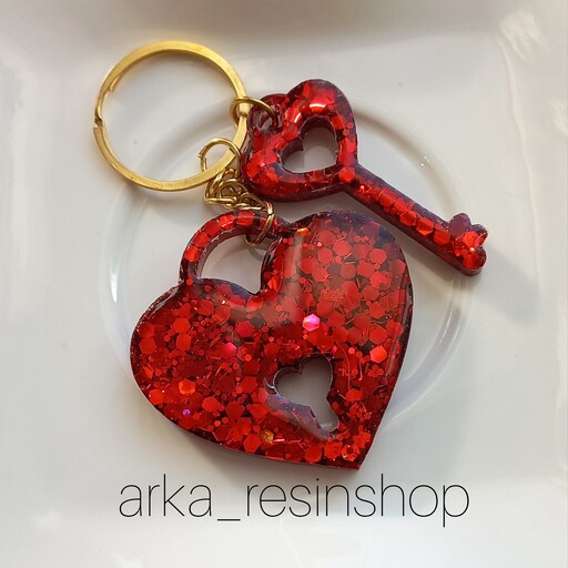 جاکلیدی و آویز کیف رزینی  مدل قلب قفلی و آویز کلید  قرمز تزئین شده با اکلیل مجیک