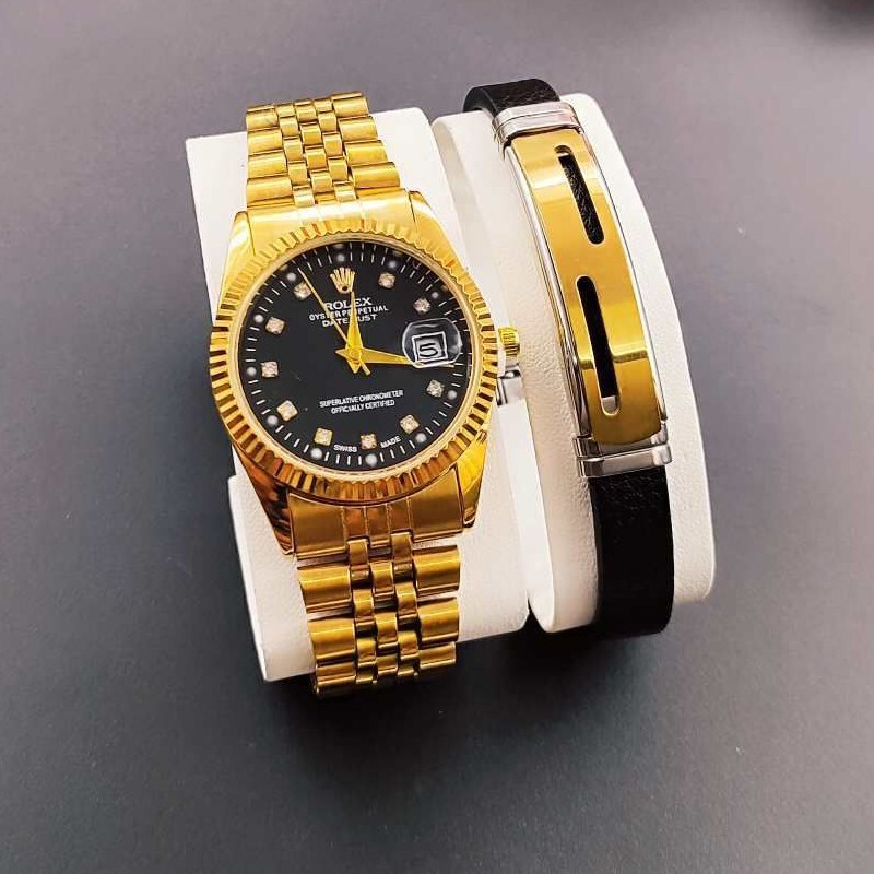 ست مردانه ست کادویی که ساعت رولکس تقویم دار  با کیفیت و دستبند چرم شیک داره و متنوع دستبندها کد 375 ع