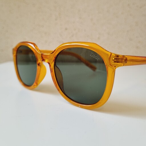 عینک آفتابی اسپرت برند دیور لنز یووی 400 گرد نارنجی قهوه ای