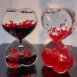 ساعت شنی قلبی  ژله ایی در دو رنگ قرمز و مشکی محصول دکوری شیک و خاص   مناسب همه ی سنین