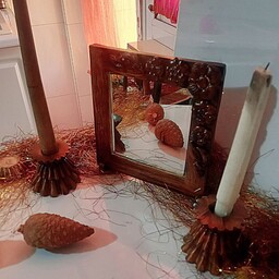 آینه دکوری طرح چوب همراه با شمعدان 