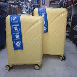 چمدان صدرصد نشکن سایز کوچک بست استار رنگ زرد