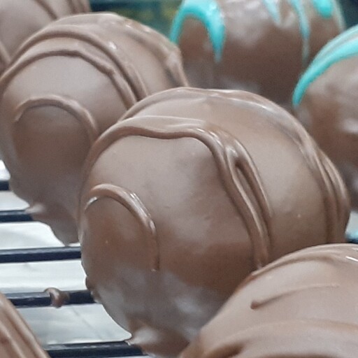 شکلات خرمایی مغزدار(500 گرمی)