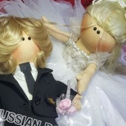 عروسک روسی سر متصل وزن هر عروسک حدودا 500 گرم قدش 35 سانت جنس لباسها از مرغوبترین پارچه های بازار قابل تعویض 