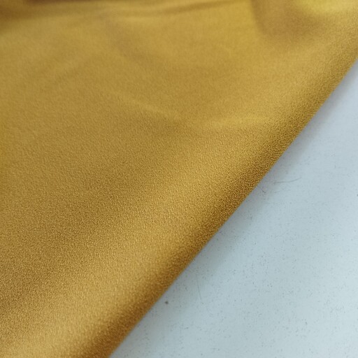 پارچه کرپ اسکاچی گرم بالا تک رنگ رنگ زرد خردلی 