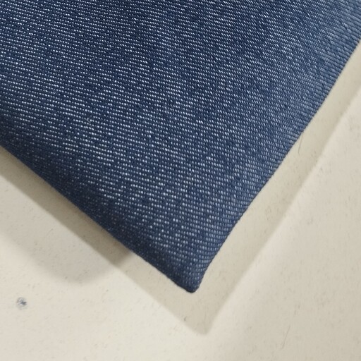 پارچه لی جین گرم بالا تک رنگ رنگ آبی تیره قیمت به ازای 10 سانت
