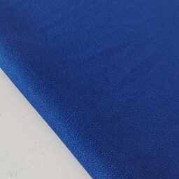 پارچه کرپ اسکاچی گرم بالا تک رنگ رنگ آبی کاربنی قیمت به ازای 10 سانت