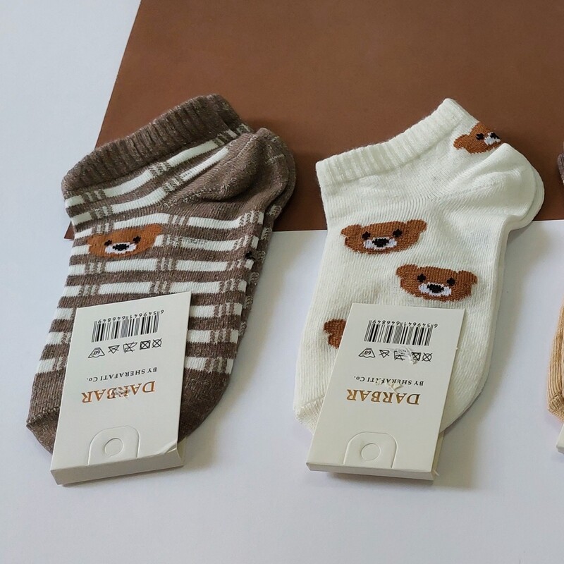 جوراب تدی نوزادی جوراب کرم قهوه ای لباس نوزادی لباس بچگانه لباس بچه گانه جوراب سایز صفر تا پنج ساق کوتاه
