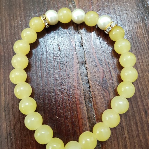 دستبند سنگ طرح مروارید رنگ لیمویی ، فری سایز مناسب برای خانم های گل و دختران عزیز