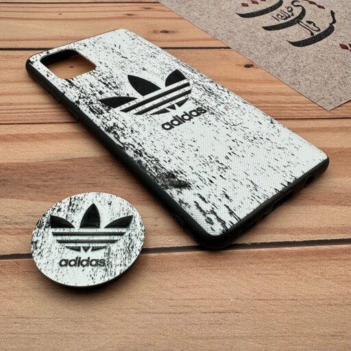 قاب گوشی Galaxy A71 سامسونگ فانتزی سوزنی برجسته طرح آدیداس Adidas پاپ سوکت دار کد 83115