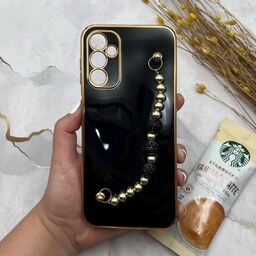 قاب گوشی Galaxy A14 سامسونگ مای کیس لاکچری My Case دستبندی نگین دار مرواریدی محافظ لنز دار مشکی دور طلایی کد 40136