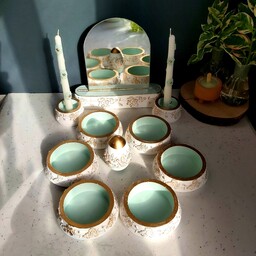 هفت سین سبز آبی سفید دارای 6کاسه یک تخم مرغ یک آینه و پایه آینه دوعدد شمعدان دو عدد شمع