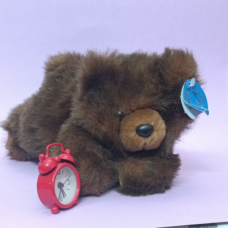 عروسک خرس قهوه  ای خوابیده (حالت لش داره) چشم تیله ای فوق العاده نرمه موهاش انگار واقعیه طول 30cm