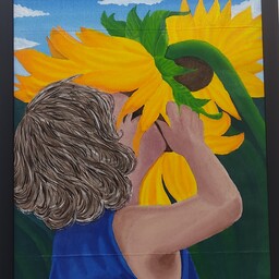 تابلو نقاشی روی پارچه طرح پسر بچه و گل آفتابگردان 
