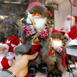 عروسک بابانوئل 35 سانت متحرک چراغدار موزیکال