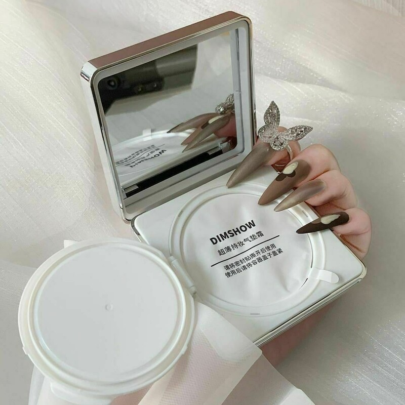 کوشن  کره ای اورجینال همراه با پد آرایشی و آینه دار به همراه ی عدد مایع کوشن اضافه اشانتیون 