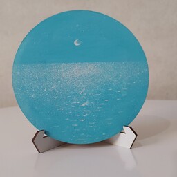نقاشی طرح دریا کارشده روی  mdf با رنگ اکریلیک ابعاد دایره با قطر 11سانتی متر