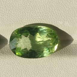نگین زبرجد الماس تراش  اصل معدنی بسیار با کیفیت و درشت با ابعاد 16 در 11 میلی متر